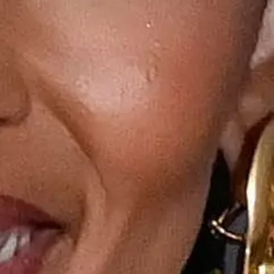 Doja Cat's skin tone — warm golden-honey at a medium depth